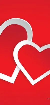 This phone live wallpaper features two paper hearts on a vibrant red background in a trendy digital art style