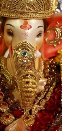 This stunning live phone wallpaper showcases a close-up of an intricate golden elephant statue
