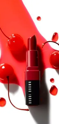 This phone live wallpaper features a red and black color scheme with a closeup of a cherry lipstick