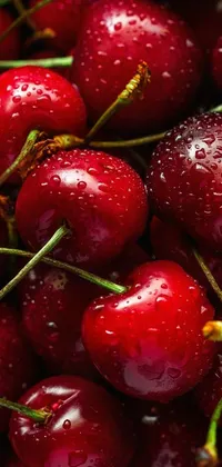 This stunning phone live wallpaper features a close-up portrait depicting a luscious bowl of juicy cherries
