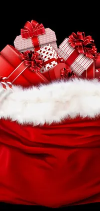 This stunning phone live wallpaper features a digital rendering of a red bag filled with various presents of different sizes and shapes