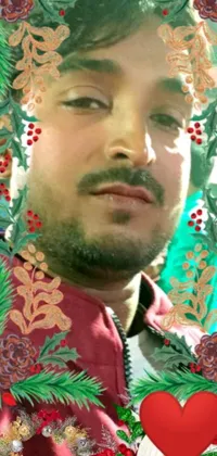 This phone live wallpaper features a festive and colorful image of an Indian man standing in front of a beautiful Christmas wreath