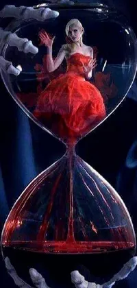 Get lost in the mesmerizing world of this unique live wallpaper! Featuring a woman in a red dress trapped in an hourglass, the swirling and distorted background creates a surreal, otherworldly effect with crystalized time warps throughout