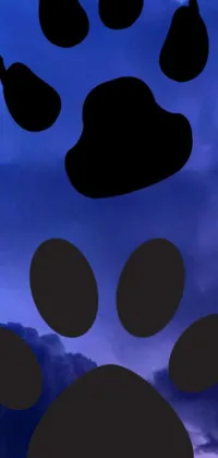 This phone live wallpaper features a silhouette of a dog's paw against a cloudy blue sky background, perfect for furry art fans