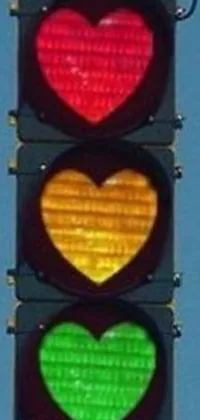 This live wallpaper for your phone showcases a traffic light adorned with red hearts, giving your device a romantic touch
