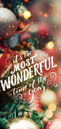 This stunning phone live wallpaper features a festive Christmas card design with the message "It's the most wonderful time of the year