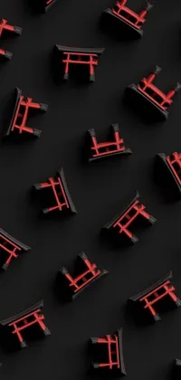 This live phone wallpaper features a striking color scheme and design with a display of red chairs set against a black surface