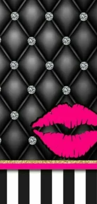 This stunning live wallpaper features a vibrant, pink lipstick with gold and sparkling gems on a black and white background