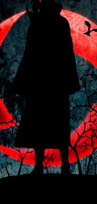 This phone live wallpaper features a spooky image of a figure in a long, black cloak standing in front of a bright red moon