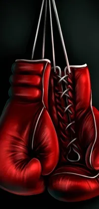 Looking for a unique and striking live wallpaper for your phone? Look no further than this design featuring a pair of red boxing gloves! With a deviantart-inspired background, this wallpaper is reminiscent of the sots art movement, with bold shades of red and a boken effect for added texture