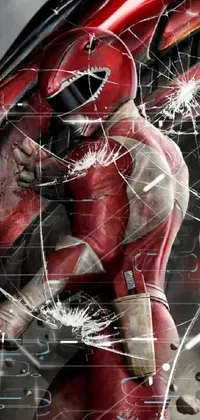 This phone live wallpaper features a striking digital art scene of a humbly armored man in a bright red suit standing by a broken glass window