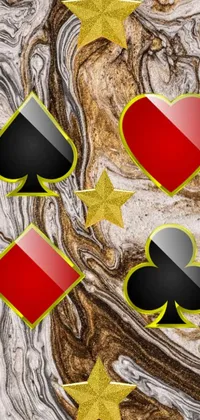 This live phone wallpaper features a group of playing cards arranged in a marbling effect pattern against a shapes background
