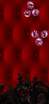This stunning live wallpaper depicts a bright red couch covered in sparkling diamonds, drawing inspiration from Baroque art