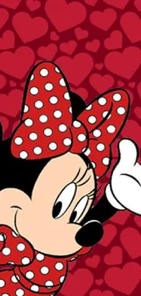 Looking for a stylish and charming Disney live wallpaper for your phone? Check out this Minnie Mouse phone wallpaper by Disney! This pop art image showcases Minnie Mouse looking partly to the left, with a splash of red hearts on a black and white backdrop