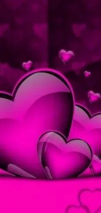 This exquisite pink heart live wallpaper is an eye-catching addition to any phone! Designed in a beautiful plum color, the heart images stand out against the textured pink background giving a stunning visual effect