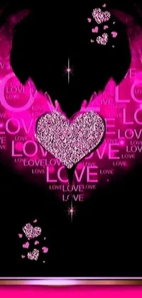 A stunning phone live wallpaper featuring a bedazzled pink heart on a black background