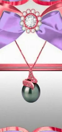 Find elegance and artistry in this close-up live wallpaper of a necklace with a bow