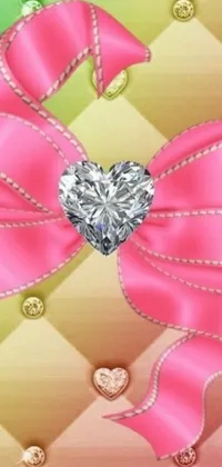 This phone live wallpaper is a stunning piece of digital art featuring a heart-shaped diamond atop a pink bow, adorned with precious stones and sparkling gems