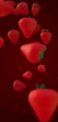 Transform your phone screen into a whimsical world of flying strawberries with this stunning live wallpaper