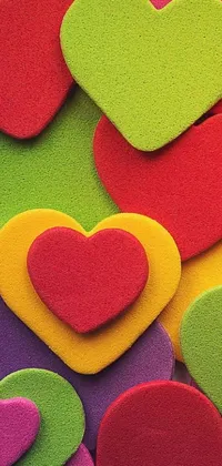 Colorful heart live wallpaper for phone featuring a bunch of vibrant hearts stacked on top of each other
