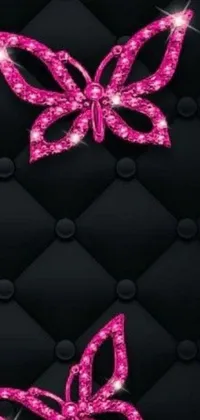 This beautiful live wallpaper showcases pink butterflies set against a sleek black background
