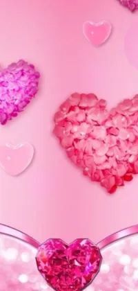 This romantic phone live wallpaper features pink hearts against a pink background epitomizing the romantic vibe