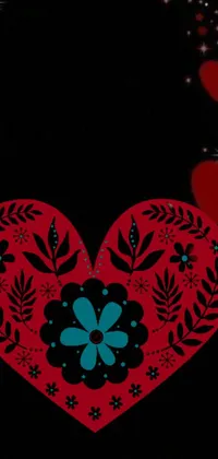 This stunning live wallpaper displays a digital rendering of a red heart adorned with blue flowers set against a black background