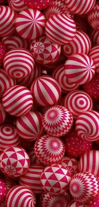 This dynamic phone live wallpaper showcases a colorful pile of Easter eggs in pink and white stripes, set against a bold op art background