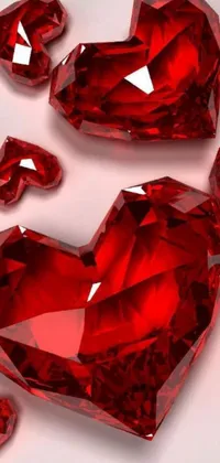 Discover the latest phone live wallpaper that features a stunning design of red diamonds arranged like a heart