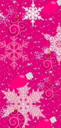 This phone live wallpaper showcases a charming pink Christmas backdrop with a touch of festivity in the form of snowy snowflakes and sparkling ornaments, crafted digitally