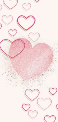 Looking for a gorgeous phone wallpaper? Our pink heart live wallpaper is exactly what you need! This beautiful wallpaper features a stunning pink heart surrounded by smaller hearts, all swirling around a glittering, sandy center