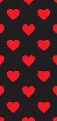 This phone live wallpaper showcases a vibrant pop art pattern of red hearts against a smooth black background with paper texture