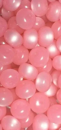 This phone live wallpaper features a close-up of pink balloons that measure 17mm and 10mm respectively