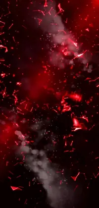 This live wallpaper features a stunning sky filled with red and white fireworks that light up the night