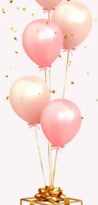 Looking to add some fun and playful vibes to your phone's wallpaper? Check out this dynamic live wallpaper featuring a vibrant and colorful display of pink balloons within a golden gift box