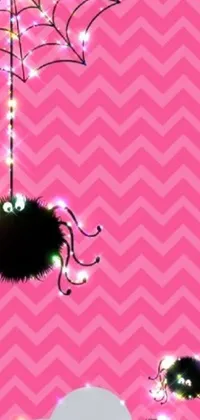 This phone live wallpaper features a spider hanging on a web against a pink background with Tumblr-inspired aesthetics such as blinking lights