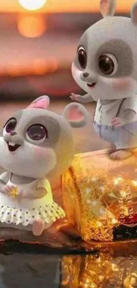 This live wallpaper showcases two mice sitting together, set with magical sparks