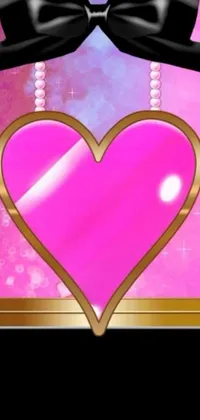 This phone live wallpaper showcases a beautiful, shiny pink heart adorned with a black bow, created from digital art with a realistic, 3D effect