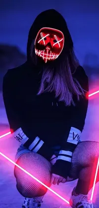 This unique live phone wallpaper features a striking image of a person donning a neon mask - adding a futuristic and spooky flair to your smartphone