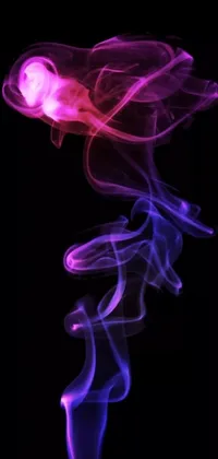 This stunning phone live wallpaper features digital art with a striking close-up of purple and pink smoke on a black background