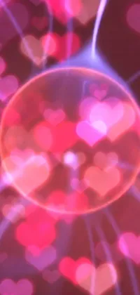 This live wallpaper features a glass filled with pink and red hearts, a hologram, energy spheres and abstract geometric shapes in vibrant shades of pink and red