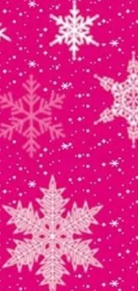 Introducing a charming pink phone live wallpaper! Featuring a delicate pattern of snowflakes and stars on a fine pink background, it could provide a soothing and serene atmosphere for your phone display