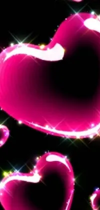 Get ready to fall in love with this stunning phone live wallpaper! You'll be captivated by a whimsical scene of pink hearts gently floating in the air against a black background