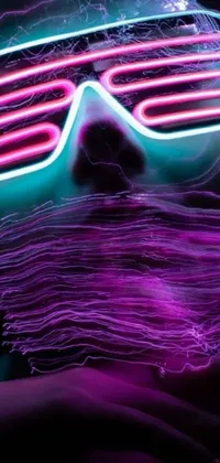 This phone live wallpaper is a burst of energy and creativity, featuring a close-up of a person wearing neon glasses
