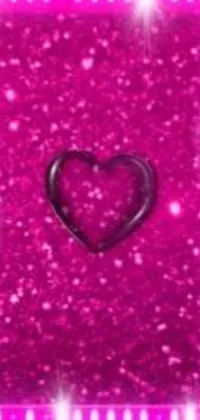 Looking for a beautiful live wallpaper for your phone? Check out this stunning pink frame with a heart at its center