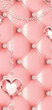 This stunning phone live wallpaper features intricately designed baroque hearts hanging from a chain on a bliss-themed background