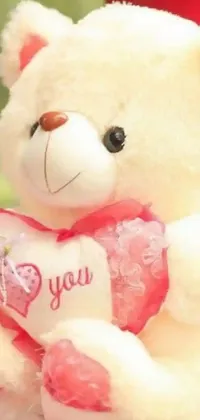 Get ready to add some adorableness to your phone with this white teddy bear live wallpaper