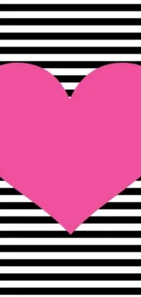 This phone live wallpaper showcases a bright pink heart surrounded by black and white stripes, emanating a vibrant and striking aura