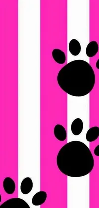 This phone live wallpaper features black and white paw prints on a vibrant pink and white striped background
