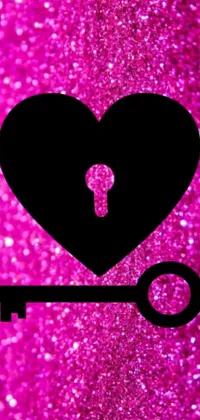 Looking for a fun and quirky live wallpaper for your phone? Check out this heart shaped key design, featuring a keyhole in the middle and a bold hot pink and black color scheme